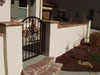 Entryways and gates of concrete, masonry, brick, lumber, etc.  enhance the look of your property.