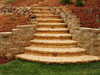 Here's another example of a custom-built stairway, this one has rounded steps and is built from cut stone.